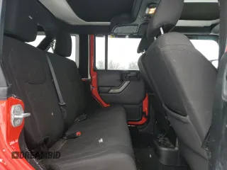 2018 Jeep Wrangler JK Unlimited Sport S with VIN 1C4BJWDGXJL827486, listed as a Copart auction lot 87605445 with 96,656 mi miles and Salvage Title. Bid and sale history available at carsss.com. Image 11.