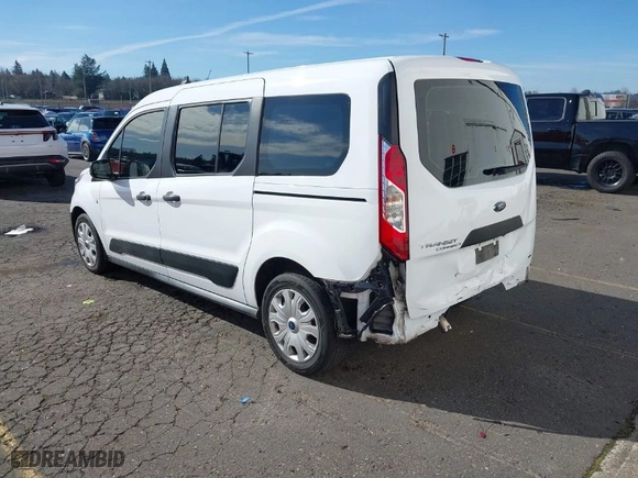 2021 Ford Transit Connect Wagon XL with VIN NM0GE9E28M1491106, listed as a IAAI auction lot 41664934 with 66,890 mi miles. Bid and sale history available at carsss.com. Image 3.
