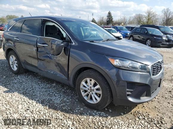2019 Kia Sorento LX z VIN 5XYPG4A57KG486900, wystawiony jako Copart lot #52674115 z przebiegiem 105 259 mil mil oraz Szkoda całkowita • Salvage title. Historia ofert i sprzedaży dostępna na DreamBid. Obrazek 4.
