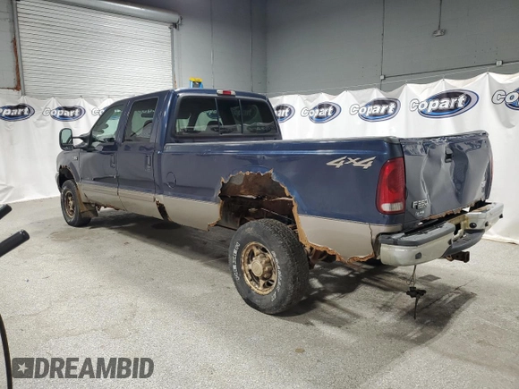 2002 Ford F-350 XL with VIN 1FTSW31F32ED59540, listed as a Copart auction lot 54148235 with 219,395 mi miles and Clean title. Bid and sale history available at DreamBid. Image 2.