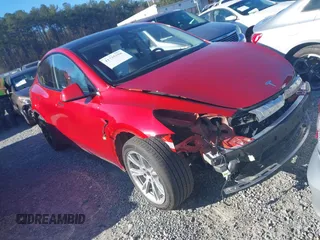 2023 Tesla Model Y Long Range z VIN 7SAYGDEE0PA202150, wystawiony jako IAAI lot #41735258 z przebiegiem 22 131 mil mil oraz . Historia ofert i sprzedaży dostępna na DreamBid. Obrazek 1.