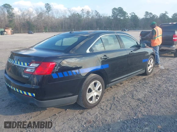 2015 Ford Police Interceptor with VIN 1FAHP2L85FG154091, listed as a IAAI auction lot 41540659 with 104,234 mi miles and . Bid and sale history available at DreamBid. Image 4.