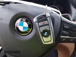 2014 BMW 7 Series 740Li with VIN WBAYE4C51ED138744, listed as a IAAI auction lot 42254213 with 116,157 mi miles and . Bid and sale history available at DreamBid. Image 11.