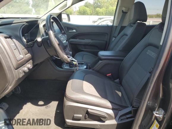 2016 GMC Canyon 4WD SLE with VIN 1GTG6CE34G1317723, listed as a Copart auction lot 68897634 with 61,975 mi miles and Salvage Title. Bid and sale history available at carsss.com. Image 7.