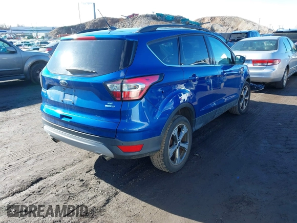 2017 Ford Escape SE with VIN 1FMCU9G91HUE28282, listed as a IAAI auction lot 41471957 with 23,552 mi miles. Bid and sale history available at carsss.com. Image 4.