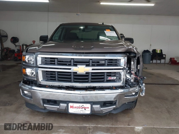 2014 Chevrolet Silverado 1500 LT with VIN 1GCVKREC5EZ147506, listed as a IAAI auction lot 41736960 with 112,399 mi miles and . Bid and sale history available at DreamBid. Image 13.