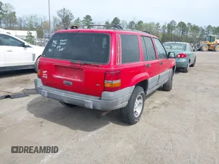 1996 Jeep Grand Cherokee Laredo with VIN 1J4FX58S4TC346218, listed as a IAAI auction lot 41943268 with 138,431 mi miles and . Bid and sale history available at DreamBid. Image 4.