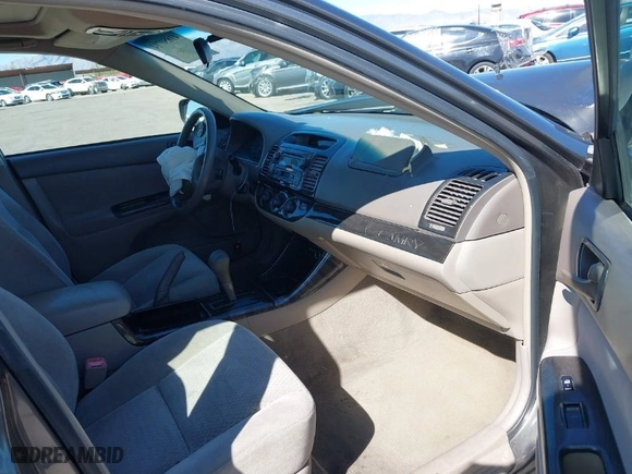 2004 Toyota Camry LE with VIN 4T1BF32K94U582052, listed as a IAAI auction lot 41850714 with 152,528 mi miles. Bid and sale history available at carsss.com. Image 5.