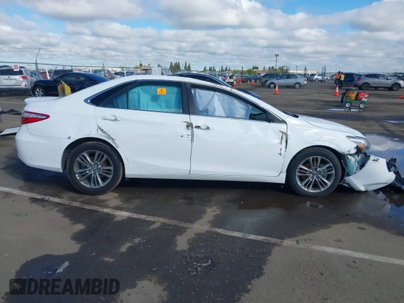 2015 Toyota Camry XLE z VIN 4T1BF1FK7FU110031, wystawiony jako IAAI lot #41906811 z przebiegiem Nie podano mil oraz . Historia ofert i sprzedaży dostępna na DreamBid. Obrazek 14.