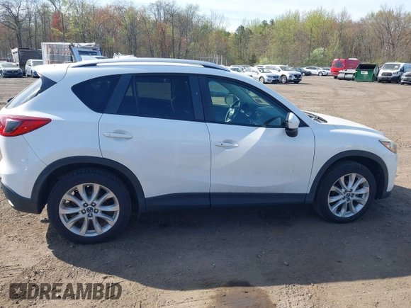 2013 Mazda CX-5 Grand Touring with VIN JM3KE4DE3D0156957, listed as a IAAI auction lot 42085443 with 146,990 mi miles. Bid and sale history available at carsss.com. Image 13.