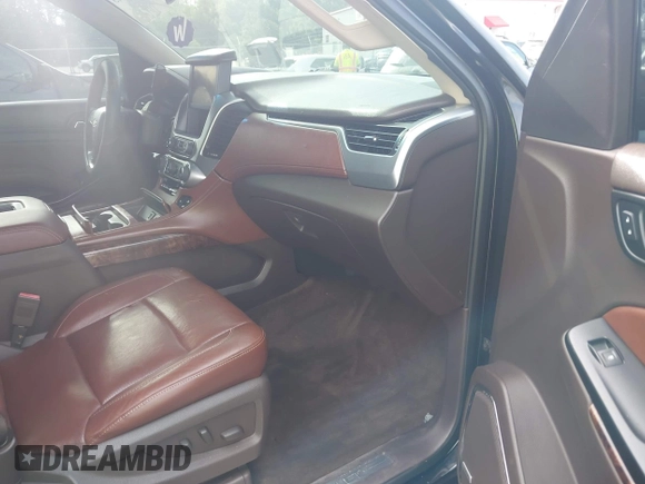 2015 Chevrolet Tahoe LTZ with VIN 1GNSCCKC5FR103676, listed as a IAAI auction lot 42456913 with 214,009 mi miles and . Bid and sale history available at DreamBid. Image 5.