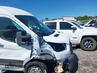 2023 Ford Transit Cargo with VIN 1FTBR1C87PKB05736, listed as a IAAI auction lot 42221931 with 40,248 mi miles and . Bid and sale history available at DreamBid. Image 17.