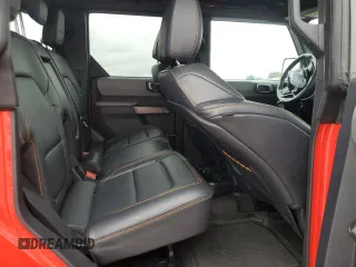 2023 Ford Bronco z VIN 1FMEE5DP4PLB13904, wystawiony jako Copart lot #56490175 z przebiegiem 29 141 mil mil oraz Szkoda całkowita • Salvage title. Historia ofert i sprzedaży dostępna na DreamBid. Obrazek 11.