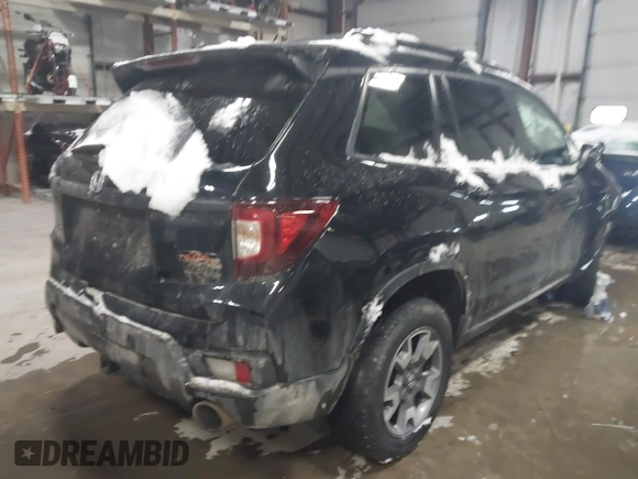 2022 Honda Passport TrailSport with VIN 5FNYF8H63NB028070, listed as a IAAI auction lot 41292236 with 39,177 mi miles and . Bid and sale history available at DreamBid. Image 4.
