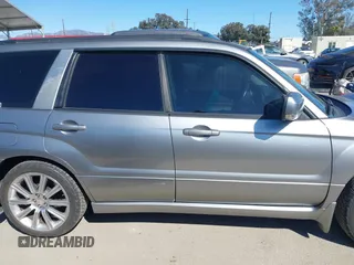 2007 Subaru Forester Sports XT with VIN JF1SG69687H733459, listed as a IAAI auction lot 41827464 with 139,943 mi miles. Bid and sale history available at carsss.com. Image 13.