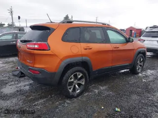 2015 Jeep Cherokee Trailhawk with VIN 1C4PJMBS5FW502185, listed as a IAAI auction lot 41535588 with 81,361 mi miles. Bid and sale history available at carsss.com. Image 4.