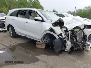2016 Kia Sorento SX z VIN 5XYPKDA53GG096415, wystawiony jako IAAI lot #42042345 z przebiegiem 132 923 mil mil oraz . Historia ofert i sprzedaży dostępna na DreamBid. Obrazek 1.