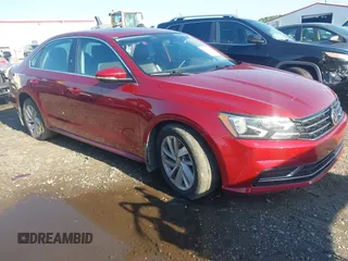 2018 Volkswagen Passat SE z VIN 1VWBA7A35JC020331, wystawiony jako IAAI lot #41970982 z przebiegiem 56 086 mil mil oraz . Historia ofert i sprzedaży dostępna na DreamBid. Obrazek 1.