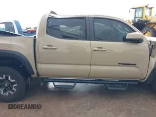 2020 Toyota Tacoma SR5 with VIN 5TFCZ5AN7LX231676, listed as a IAAI auction lot 42596728 with 101,362 mi miles and . Bid and sale history available at DreamBid. Image 13.