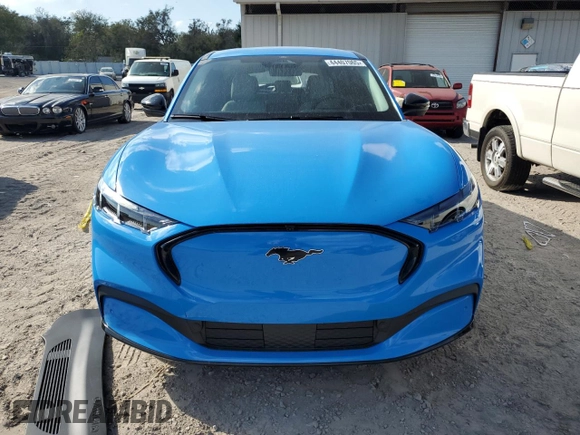 2024 Ford Mustang Mach-E Premium z VIN 3FMTK3R72RMA32365, wystawiony jako Copart lot #44407065 z przebiegiem 3 940 mil mil oraz Szkoda całkowita • Salvage title. Historia ofert i sprzedaży dostępna na DreamBid. Obrazek 5.