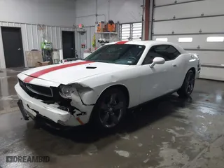 2013 Dodge Challenger SXT with VIN 2C3CDYAG8DH554016, listed as a IAAI auction lot 41275678 with 55,826 mi miles. Bid and sale history available at carsss.com. Image 2.