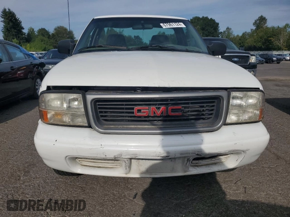 2002 GMC Sonoma SL z VIN 1GTCS145828259598, wystawiony jako Copart lot #67961124 z przebiegiem 183 710 mil mil oraz Szkody całkowita. Historia ofert i sprzedaży dostępna na DreamBid. Obrazek 5.