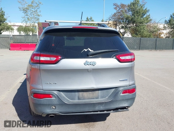 2015 Jeep Cherokee Latitude z VIN 1C4PJMCB0FW749323, wystawiony jako IAAI lot #41852102 z przebiegiem 162 060 mil mil oraz . Historia ofert i sprzedaży dostępna na DreamBid. Obrazek 16.