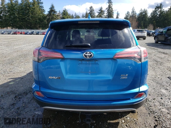 2018 Toyota RAV4 XLE with VIN 2T3RFREV3JW752934, listed as a Copart auction lot 48942015 with 74,182 mi miles and Salvage Title. Bid and sale history available at DreamBid. Image 6.