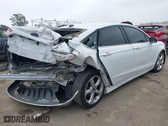 2014 Ford Fusion SE Hybrid with VIN 3FA6P0LU0ER189444, listed as a IAAI auction lot 42291020 with 187,148 mi miles and . Bid and sale history available at DreamBid. Image 4.