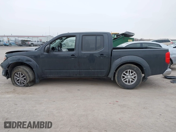 2014 Nissan Frontier SV with VIN 1N6AD0EV9EN726119, listed as a IAAI auction lot 41349641 with 139,652 mi miles and . Bid and sale history available at DreamBid. Image 14.