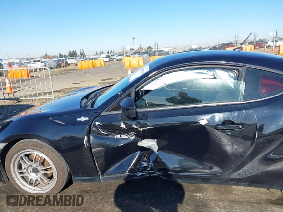 2014 Scion FR-S z VIN JF1ZNAA18E9700718, wystawiony jako IAAI lot #40958319 z przebiegiem 104 010 mil mil oraz . Historia ofert i sprzedaży dostępna na DreamBid. Obrazek 6.