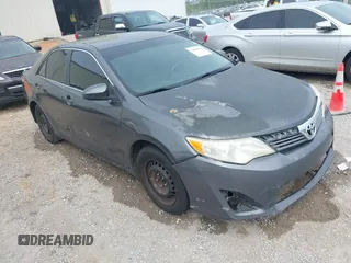 2014 Toyota Camry L with VIN 4T1BF1FK1EU771679, listed as a IAAI auction lot 42090764 with 216,362 mi miles and . Bid and sale history available at DreamBid. Image 1.