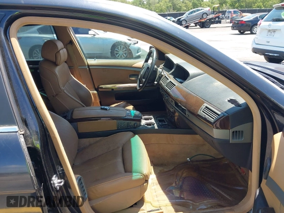2005 BMW 7 Series 745Li with VIN WBAGN63545DS59212, listed as a IAAI auction lot 42510606 with 124,395 mi miles and . Bid and sale history available at DreamBid. Image 5.