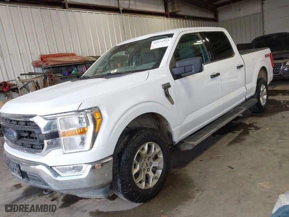 2021 Ford F-150 XL with VIN 1FTFW1E82MFB31401, listed as a IAAI auction lot 41974324 with 112,933 mi miles. Bid and sale history available at carsss.com. Image 2.