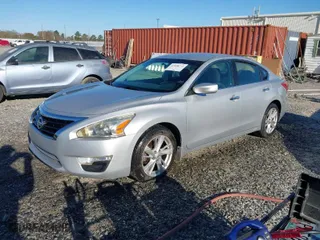 2013 Nissan Altima 2.5 SL with VIN 1N4AL3AP9DC266457, listed as a IAAI auction lot 41858272 with 310,998 mi miles. Bid and sale history available at carsss.com. Image 2.