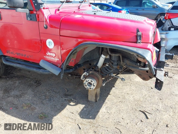 2004 Jeep Wrangler Sport Right Hand Drive with VIN 1J4F449S74P796957, listed as a IAAI auction lot 41987562 with 106,730 mi miles and . Bid and sale history available at carsss.com. Image 6.