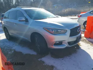 2016 Infiniti QX60 with VIN 5N1AL0MM8GC518533, listed as a IAAI auction lot 41352229 with 100,185 mi miles and . Bid and sale history available at DreamBid. Image 1.
