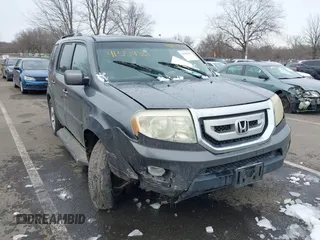 2011 Honda Pilot EX-L with VIN 5FNYF4H65BB009279, listed as a IAAI auction lot 41554301 with 226,337 mi miles and . Bid and sale history available at carsss.com. Image 6.