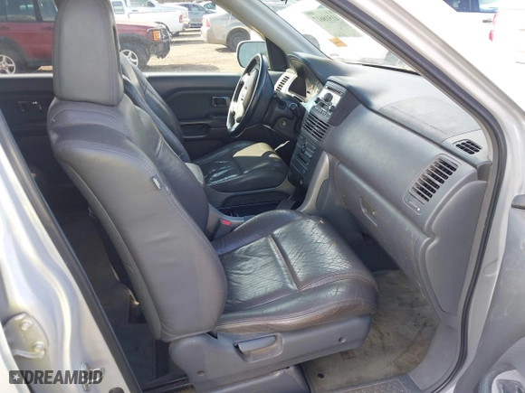 2003 Honda Pilot EX with VIN 2HKYF18693H591369, listed as a IAAI auction lot 41518617 with 325,658 mi miles. Bid and sale history available at carsss.com. Image 5.