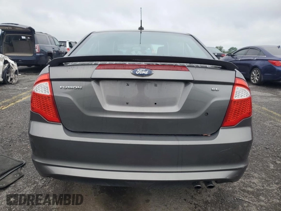 2012 Ford Fusion SE with VIN 3FAHP0HA3CR127721, listed as a Copart auction lot 64726335 with 175,332 mi miles and Salvage title. Bid and sale history available at DreamBid. Image 6.