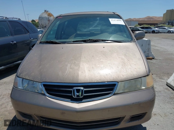 2003 Honda Odyssey EX-L with VIN 5FNRL18993B127164, listed as a IAAI auction lot 42474080 with 152,838 mi miles and . Bid and sale history available at DreamBid. Image 6.