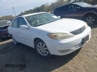 2003 Toyota Camry LE with VIN 4T1BE32K33U249945, listed as a IAAI auction lot 41907000 with 279,723 mi miles and . Bid and sale history available at DreamBid. Image 1.