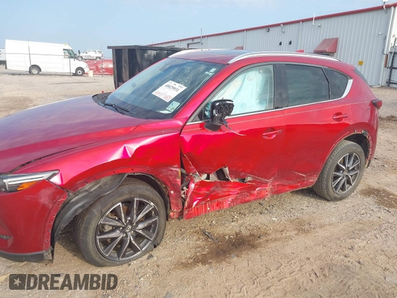 2017 Mazda CX-5 Grand Touring with VIN JM3KFADL8H0189033, listed as a IAAI auction lot 40029931 with 88,933 mi miles and . Bid and sale history available at carsss.com. Image 6.