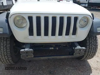 2018 Jeep Wrangler Unlimited Sport S with VIN 1C4HJXDG8JW127299, listed as a IAAI auction lot 42091561 with 116,082 mi miles and . Bid and sale history available at DreamBid. Image 17.