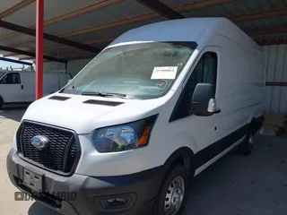 2022 Ford Transit Cargo with VIN 1FTBW3X89NKA69141, listed as a IAAI auction lot 41980864 with 102,721 mi miles and . Bid and sale history available at DreamBid. Image 2.