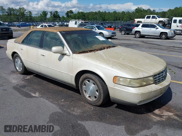2001 Cadillac Seville Luxury SLS z VIN 1G6KS54Y81U110047, wystawiony jako IAAI lot #42436746 z przebiegiem 107 360 mil mil oraz . Historia ofert i sprzedaży dostępna na DreamBid. Obrazek 1.
