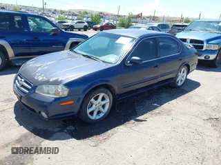 2002 Nissan Maxima GXE with VIN JN1DA31D92T408633, listed as a IAAI auction lot 42804201 with 199,403 mi miles and . Bid and sale history available at DreamBid. Image 2.