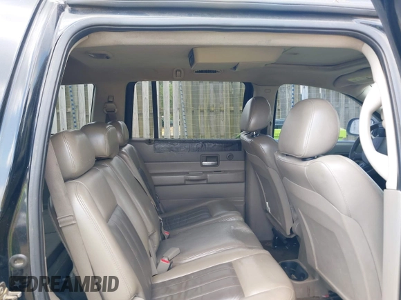 2004 Dodge Durango Limited z VIN 1D4HB58D04F112272, wystawiony jako IAAI lot #42727652 z przebiegiem 144 182 mil mil oraz . Historia ofert i sprzedaży dostępna na DreamBid. Obrazek 8.