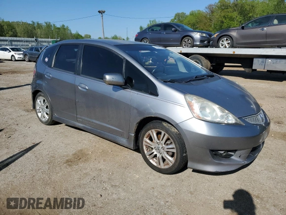 2009 Honda Fit Sport с VIN JHMGE88459S048194, выставлен на аукционе Copart как лот 52581055 с пробегом 177 290 миль миль и Списание • Salvage title. История ставок и продаж доступна на DreamBid. Изображение 4.