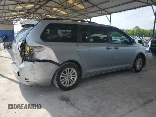 2012 Toyota Sienna XLE AAS с VIN 5TDYK3DC1CS240100, выставлен на аукционе Copart как лот 56975235 с пробегом 251 340 миль миль и Списание • Salvage title. История ставок и продаж доступна на DreamBid. Изображение 3.
